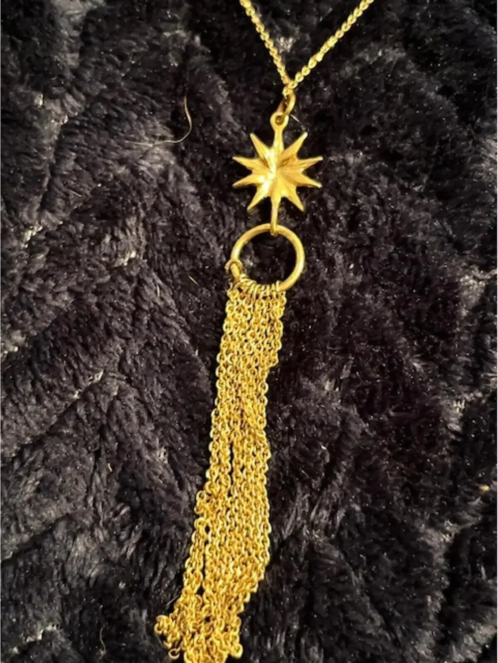 Gold Tone Starburst Tassel Necklace